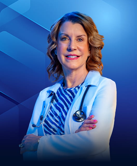 Wendy L. Wright, FNP, smiling in a white coat with stethoscope, arms crossed.